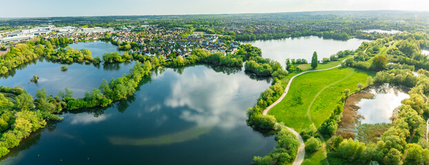 Aerial drone view of .Leybourne Lakes and housing estate, Aylesford, Kent, England