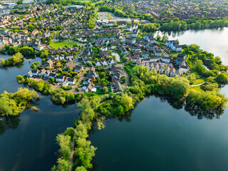 Aerial drone view of .Leybourne Lakes and housing estate, Aylesford, Kent, England