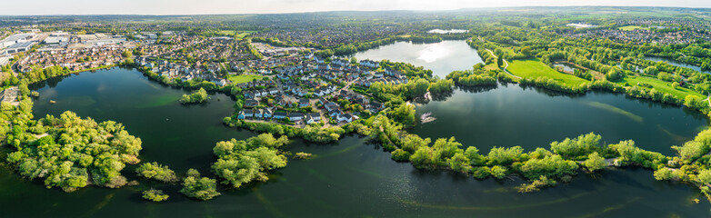 Aerial drone view of .Leybourne Lakes and housing estate, Aylesford, Kent, England