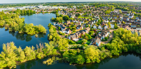 Aerial drone view of .Leybourne Lakes and housing estate, Aylesford, Kent, England