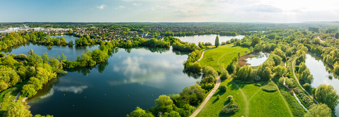 Aerial drone view of .Leybourne Lakes and housing estate, Aylesford, Kent, England