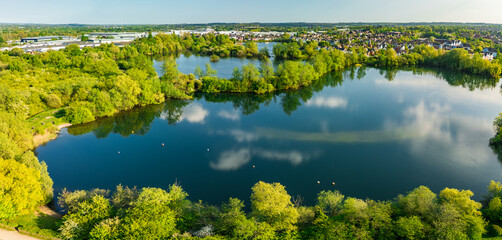 Aerial drone view of .Leybourne Lakes and housing estate, Aylesford, Kent, England