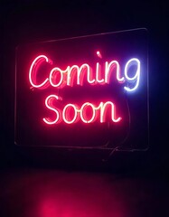 Neon sign displaying the words "Coming Soon" in bright colors against a dark background