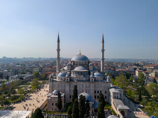 Naklejka premium Stunning Aerial View of the Fatih Mosque in Istanbul. An aerial shot of the magnificent Fatih Mosque in Istanbul, Turkey. Hagia Sophia, Suleymaniye, Sultanahmet, Blue Mosque, islam symbol, ramadan