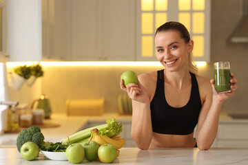 Weight loss. Happy woman with healthy shake and apple at white marble table in kitchen