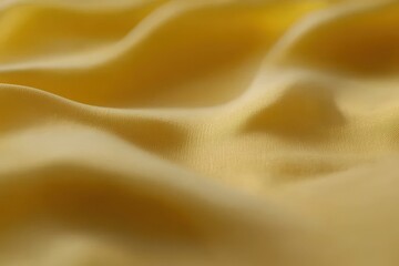 Obraz premium Soft, flowing, yellow fabric drapes gracefully