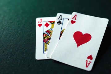 Fototapeta premium Playing cards arranged in a royal flush sequence , flush, ace