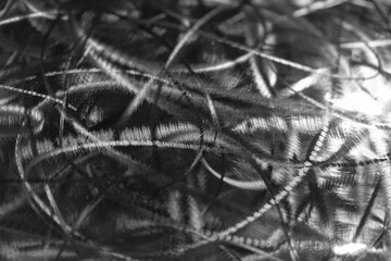 Abstract metallic texture with grunge pattern in black and white for artistic background design.