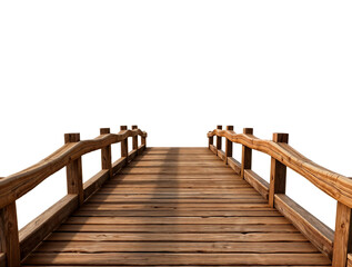 Fototapeta premium A wooden walkway stretches across the sandy beach towards the vast sea under the open sky
