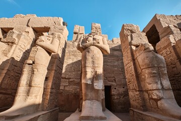 Luxor, Egypt - December 26 2023: Ramesses III Temple, Ramses statues at the Karnak Temple