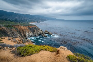 Obraz premium Windswept Moor and Rugged Cliff Overlooking Grey Ocean Horizon