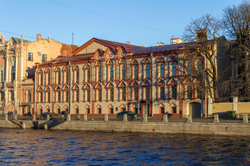 Naklejka premium Fontanka Embankment, the former home of N.F. Karlova, built in 1843, now the central city public library named after V.V. Mayakovsky: St. Petersburg, Russia - November 12, 2022