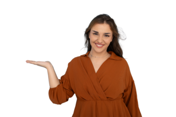 Professional businesswoman displaying open palm with available marketing space on neutral background