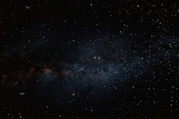 Fototapeta premium Expansive night sky filled with countless stars and a dense milky band creating a serene and infinite cosmic landscape