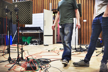 Recording studio, production and equipment with artists, producer and song with audio, sound and...