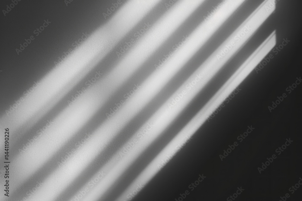Poster soft diagonal beams of light casting striped shadows on a textured wall creating a calm and minimali