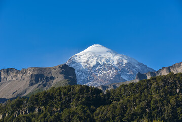peak of cone-shaped volcano Lanin with its glacier, patagonia, argentina