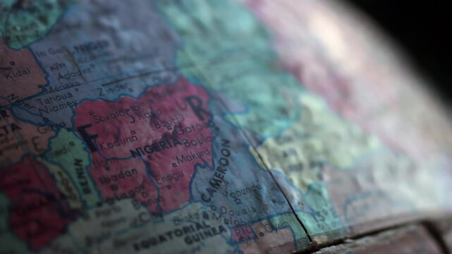 Old World Map Showing Closeup of Nigeria With Worn Surface and Colored Details - 4K