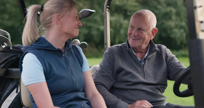 Happy, people and talking in golf cart on course with friends or personal trainer chat with senior man. Woman, smile and elderly golfer relax and drive kart on lawn in retirement, vacation or holiday