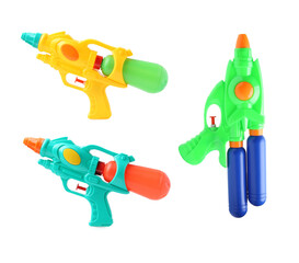 Colorful plastic water guns isolated on white, set. Child's toy