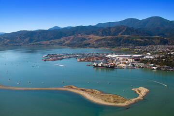 Nelson, New Zealand. Aerial view of city, suburbs, port, harbour, hills and the Boulder Bank, a...