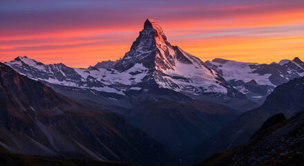 Fototapeta premium Matterhorn Mountain Peak at Sunrise with Snow and Colorful Sky