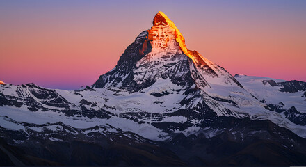 Matterhorn Mountain Peak Glowing at Sunrise with Snow and Colorful Sky