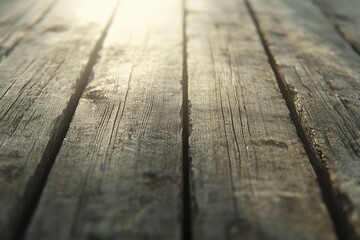 Close-up view of weathered wooden planks with sunlight.