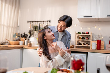 Asian romantic man surprise his girlfriend with a marriage proposal.