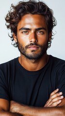 Fototapeta premium Portrait of a Handsome Man with Curly Hair and Brown Eyes