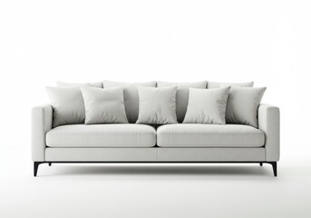 Fototapeta premium A white sofa with several pillows against a white background in a studio setting for product photography