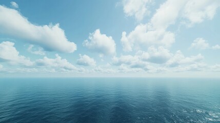 Obraz premium Serene Vast Ocean Under Bright Blue Sky with Fluffy White Clouds and Calm Waters Extending to the Horizon in a Tranquil Nature Scene