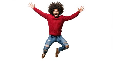 Man with afro jumping in air wearing red sweater and ripped jeans on a white background with arms raised