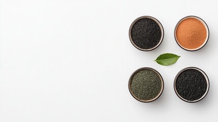 A under 200 characters: Four bowls of assorted loose tea leaves and powders with a green leaf on a white background, arranged in a minimalist style.