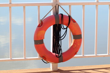 Safety swim ring at the fence of river shore and sea shore. Standard security for tourism. 