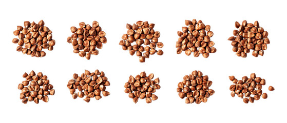 Ten small piles of dried buckwheat grains are neatly arranged in two rows for food ingredient presentation isolated on transparent