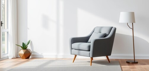 Grey fabric armchair in modern living room with floor lamp, home, home staging