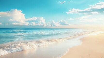 Obraz premium Serene tropical beach scene with azure ocean waves and fluffy clouds peaceful summer vacation paradise