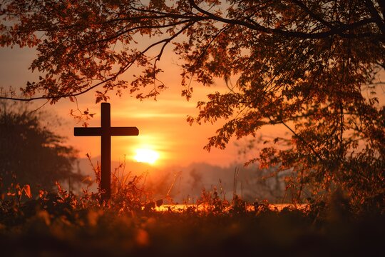 Ascension day concept: Silhouette the cross on autumn sunset background