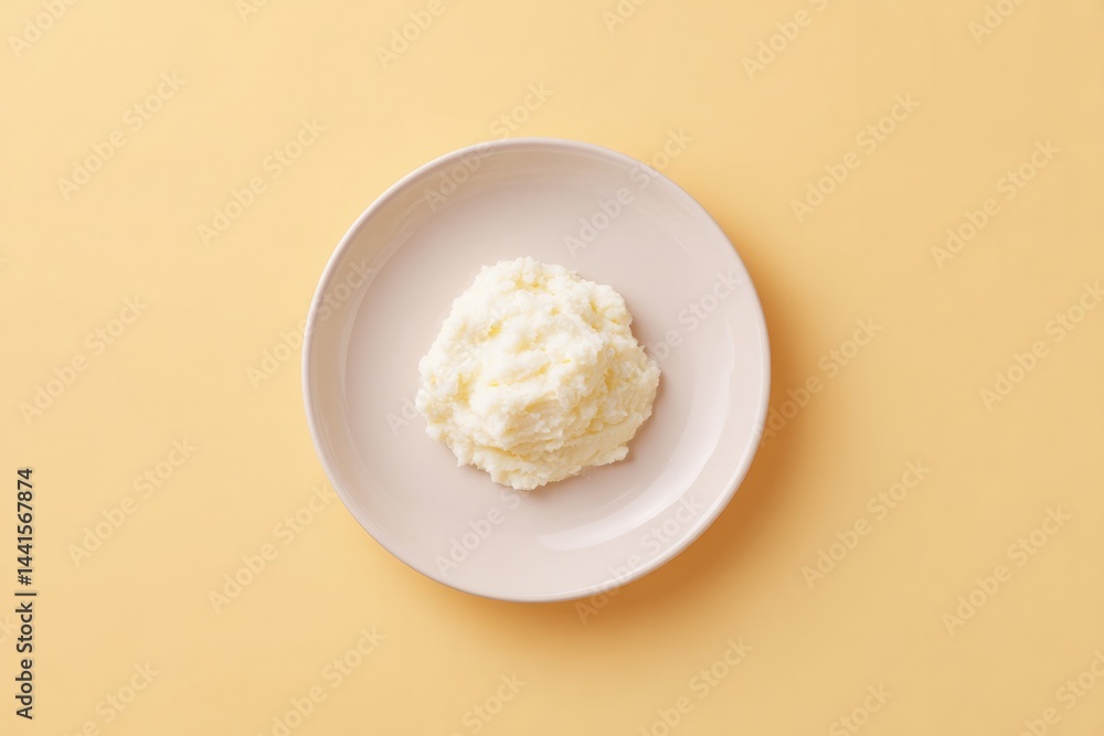 Aufkleber top-down view of single serving of mashed potatoes elegantly plated on clean solid color background