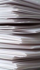 stack of papers sitting on top of a table