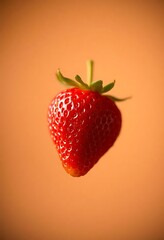 close up of a single strawberry on a brown background