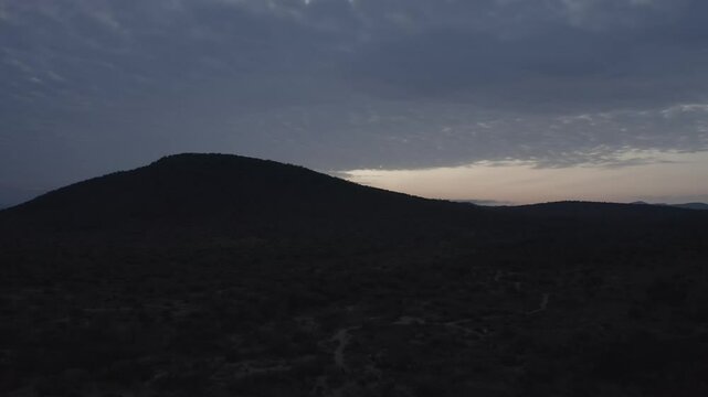 Traditional Maasai Village in Savannah Landscape