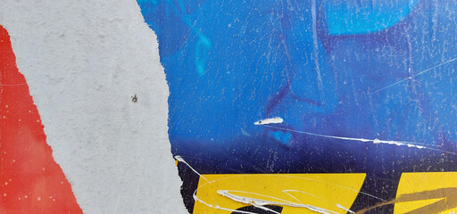 Torn and ripped old poster background, peeled paper, and weathered texture