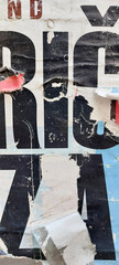 Torn and ripped old poster background, peeled paper, and weathered texture