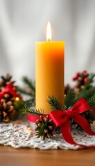 lit candle sitting on top of a table