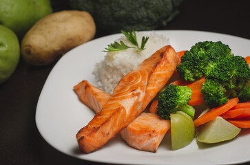 Grilled Salmon Fillet with Steamed Vegetables and Rice