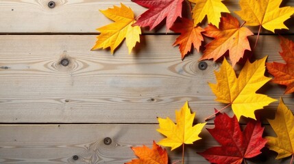 Autumnal foliage arranged on a rustic wooden surface provides a warm and inviting seasonal background