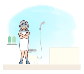 冷えた浴室で震える高齢女性