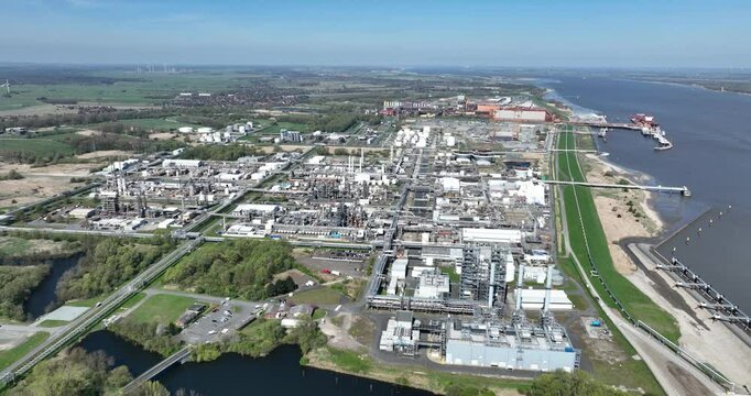 Chemical Company, at the Elbe river, Stade, Germany, aerial drone view.